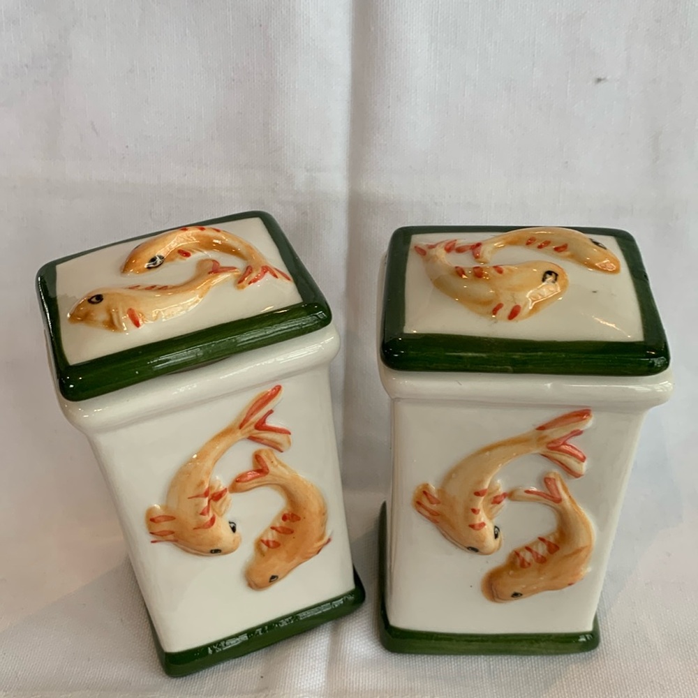 Porcelain containers with a fish design from Malta. New